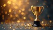 © Viktor - Golden trophy award sits on black base surrounded by festive confetti. Glistering bokeh, sparkle effects create glamorous, luxury feel. Metallic cup with handles signifies victory, achievement,