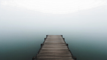  Wooden Pier Stretching into a Foggy Lake Landscape offering Tranquility and Solitude for Contemplation and Reflection