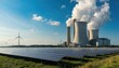 © miss irine - Renewable energy sources like solar panels, wind turbines coexist with traditional coal power plant. Juxtaposition highlights transition in energy infrastructure towards cleaner alternatives. Image