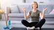 © Prostock-studio - Full length of mature woman meditating with closed eyes, making gyan mudra with her hands at home. Peaceful senior lady doing yoga, finding inner balance during covid lockdown