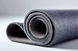 © Dina - Rolled rubber flooring mat showcasing textured surface and flexibility for versatile applications