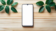 © Shathi - Blank Smartphone Screen on Wooden Surface with Greenery, rosemary on a wooden board