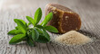 © Odye Design Art - Fresh stevia plant with jaggery and granulated raw sugar on a rustic wooden table