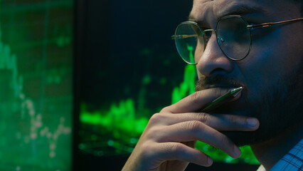 indian arabian man programmer coder hacker male guy trader it specialist thoughtful analyst thinking