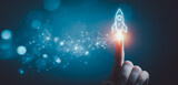 Futuristic hand launching digital rocket with finger touch, symbolizing startup innovation, technology growth, entrepreneurship, and digital transformation in modern business.