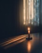 © grey - A single candle glows softly in dusk light, creating a moody and minimalist composition of calm solitude.