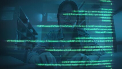 A young, serious Asian female programmer works with code on a transparent screen overlay, representing concepts of coding, technology, cybersecurity, and software development.