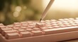 © FARJANAAKTER - Closeup of a pink mechanical keyboard with a stylus touching a key