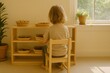 © Tri - Montessori inspired early learning scenes featuring children exploring with hands on educational tools in a calm, natural light environment.