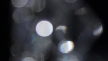 Wall Mural - Abstract glow bokeh bubble particles flying on black background