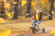 © Igor Yaruta - Happy child having fun outdoor in autumn park