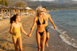 © BGStock72 - Joyful family moments by the beach during a sunny afternoon in summer