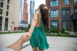 © Andrey_Arkusha - Follow me. Young woman holding a mans hand. Travel with me