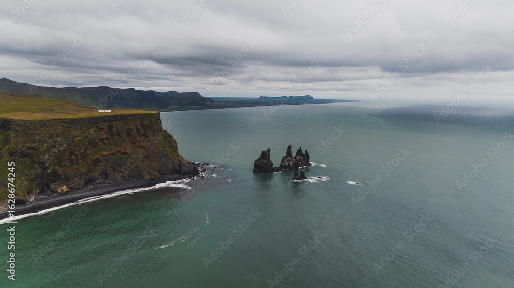 Reynisdrangar Sea Stacks and Black Sand Beach in Iceland Stock Photo ...