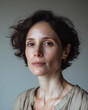 © Pere Chuliá - Intimate portrait of Southern European woman with tousled short hair in soft diffused light