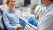 © Johannes - medicine dentistry and healthcare concept  male dentist with clipboard talking to female patient and discussing teeth treatment at dental clinic office no logos no brands ar 169