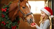 © detiyy - Girl feeding horse with apple Christmas