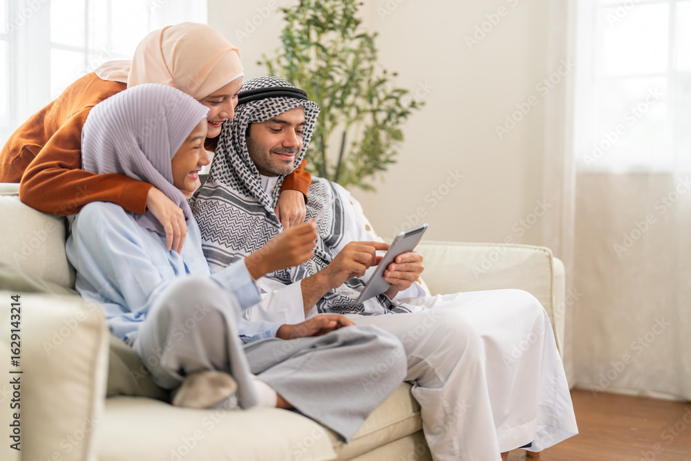 Muslim family learning online use tablet for homeschool education ...