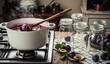 © Bayhaki - Steaming plum jam bubbles in a pot with jars ready for preserving homemade deliciousness