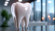 © Dmitriy - Shiny molar tooth displayed in a modern dental clinic, highlighting advanced dental technology and pristine oral health.