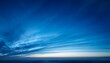© Judith - abstract blue horizon striped cloudscape at dusk low light photography stock photo
