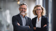 © valeo5 - A friendly and confident portrait of two business professionals. Image conveys trust, expertise, collaboration, making it perfect for corporate websites, business profiles, and promotional materials