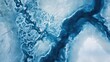 © NATALIEJANE - Top down Satellite view of a frozen Arctic landscape intricate ice patterns deep blues and whites
