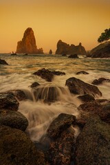 Wall Mural - serene seascape at papuma beach at sunset.