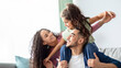 © Prostock-studio - Portrait Of Cheerful Middle Eastern Family Of Three Having Fun Together At Home. Young Arabic Parents Playing With Their Little Daughter In Living Room, Mom, Dad And Child Smiling And Laughing