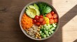 © antuanetto - Buddha bowl with fresh vegetables and quinoa on wooden surface