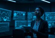 © Arif - African American woman analyzes data on tablet in a dark control room