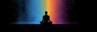 © Sai Tunyee - Silhouette meditate with olorful light black background panorama mental health.