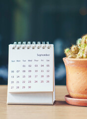 Wall Mural - 2025 calendar desk placed on business office table. desktop calender for planner to plan wedding age