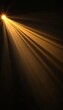© Andrei - Golden Rays of Light Shine Brightly from Above, Casting Beautiful Beams on a Dark Background