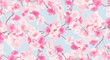 © bangoji - Seamless pattern of blooming cherry blossoms on a light blue background creating a serene spring aesthetic with delicate pink flowers and branches