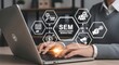 © Anwar Fauzan - SEM, Search Engine Marketing Concept. Businessperson working on laptop with SEM icons, featuring ads, analytics, keywords, reach, pay per click, online marketing tools, digital advertising strategy,