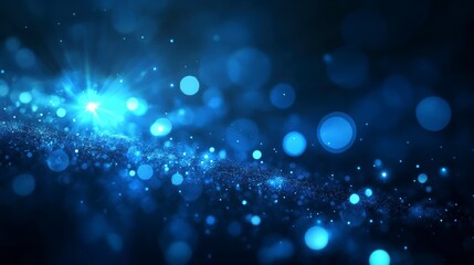 Wall Mural - abstract blue bokeh background with glowing particles and light streaks.