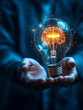 © AdolescentChat - Businessman holding a lighting light bulb symbolizing innovation and inspiration against a technological background