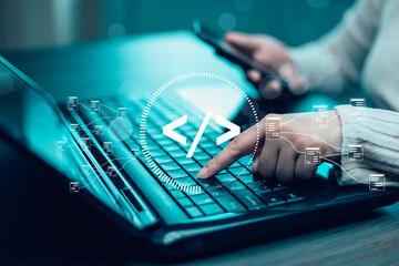 Businessman hand touch with Code html and programming on screen laptop,Programmer development Computer code,web design  coding technology in software, digital software technology development, IoT