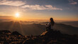 © PATMALUPHOTO - A woman sits on a rocky peak, silhouetted against a sunrise over distant mountains. The sun bursts through the clouds, casting rays across the landscape. Mantova refuge al Vioz, Peio, Trentino.