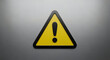 © Candra - Bright Yellow Exclamation Point Sign For Hazards On Industrial Metal Background