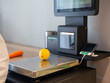 © Михаил Решетников - Woman weighing a lemon at a self-checkout.