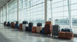 © Thiago - A long line of assorted luggage, including rolling suitcases and duffel bags, awaiting transport.