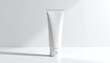 © Design - Minimalist White Cosmetic Tube Mockup on Clean Background