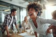 © DIMENSIONS - Joyful group of young professionals laughing together in a modern office setting, showcasing teamwork, collaboration, and a positive work environment with vibrant and energetic interactions