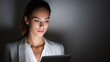 © admin_design - Confident young professional business woman holding a modern laptop, representing digital technology and successful remote work in corporate environment.