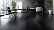 © sukrisna - Modern dark office interior.  Spacious room with dark floors and furniture.  Large windows
