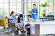 © Bangkok Click Studio - Asian doctor physiotherapy check splint leg support to senior old woman patient assisted by caregiver and nurse medical orthopedic trauma treatment team providing rehabilitation in a healthcare clinic