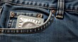 © Volha - Condom placed in the front pocket of blue denim jeans