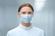 © JK_kyoto - Female Medical Professional in Protective Gear in Clinic